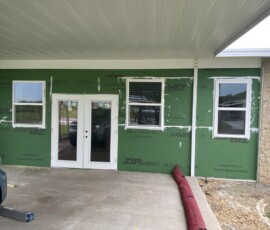 Door and window framing Enclosure wall with new door and window openings