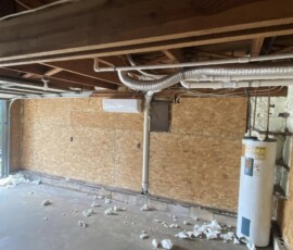 Interior wall sheathing Wall sheathing and overhead timber framing during interior work